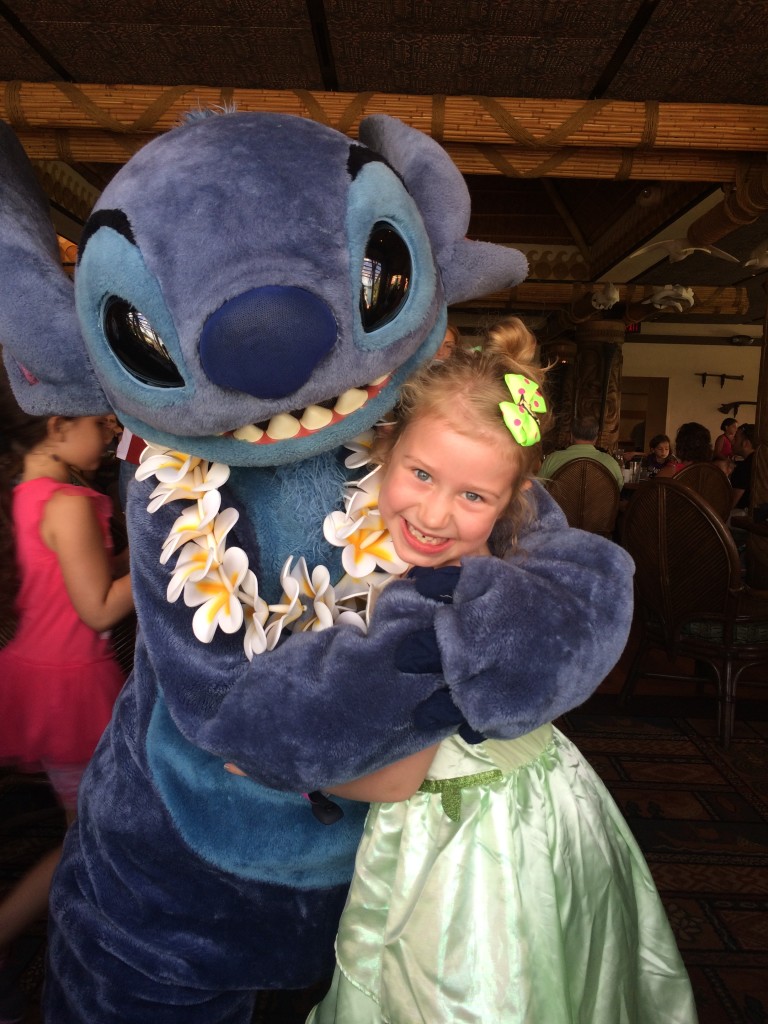 Cuddles with Stitch at Ohana!